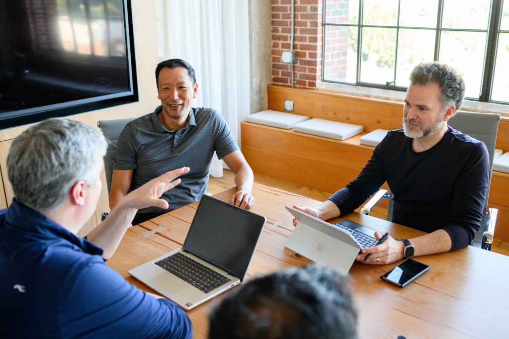 people talking at a table