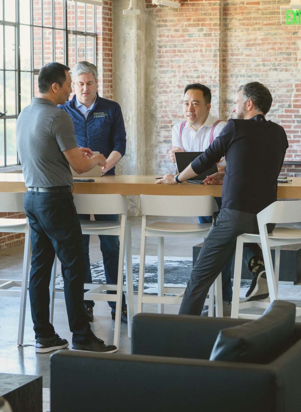 people talking at a table