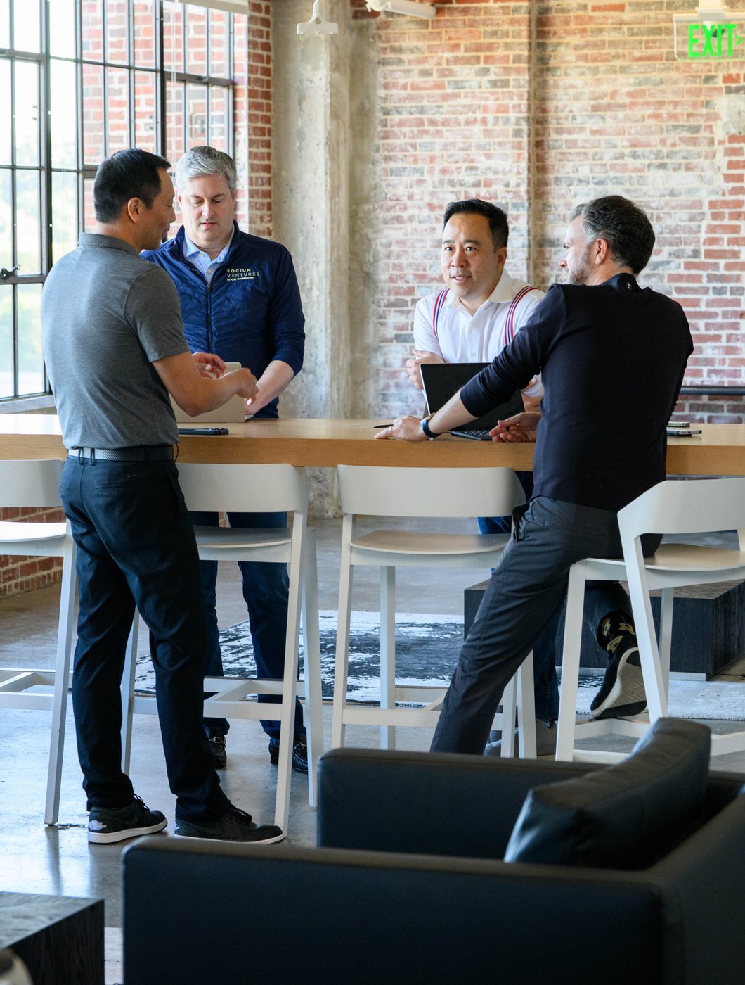 people talking at a table